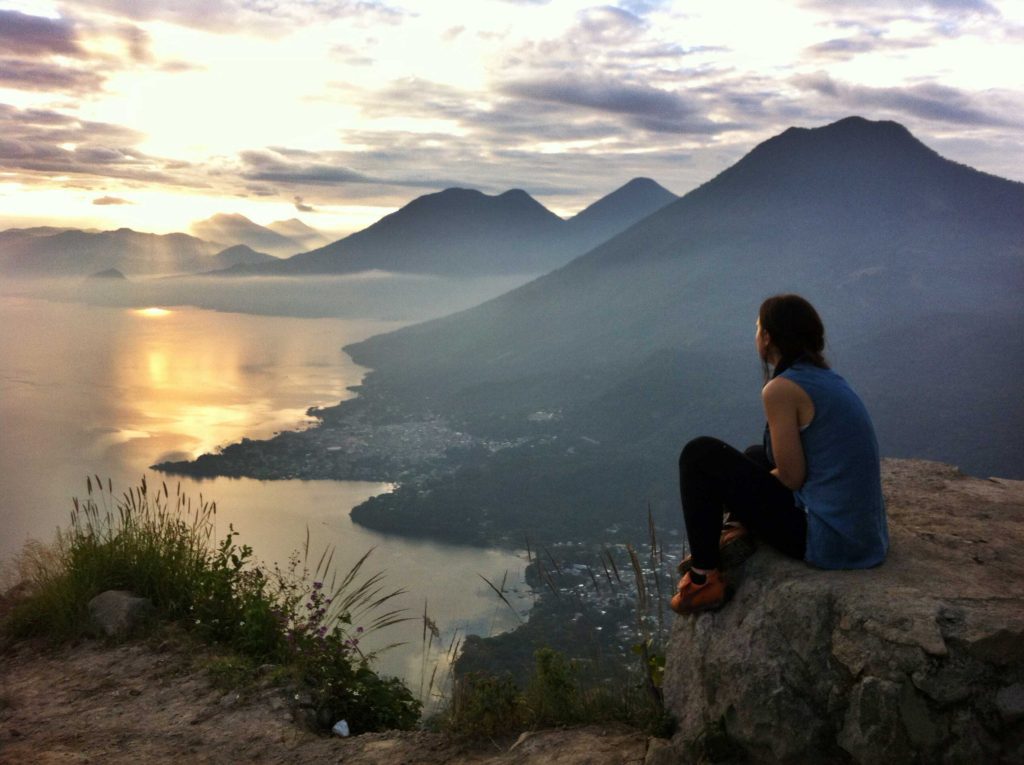 Watching the sunrise after a morning hike on Lake Atitlan, Guatemala.