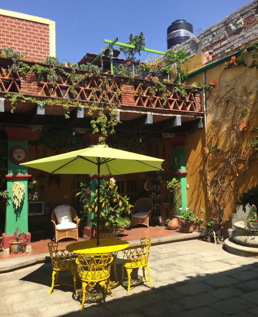 Central courtyard with table and chairs.