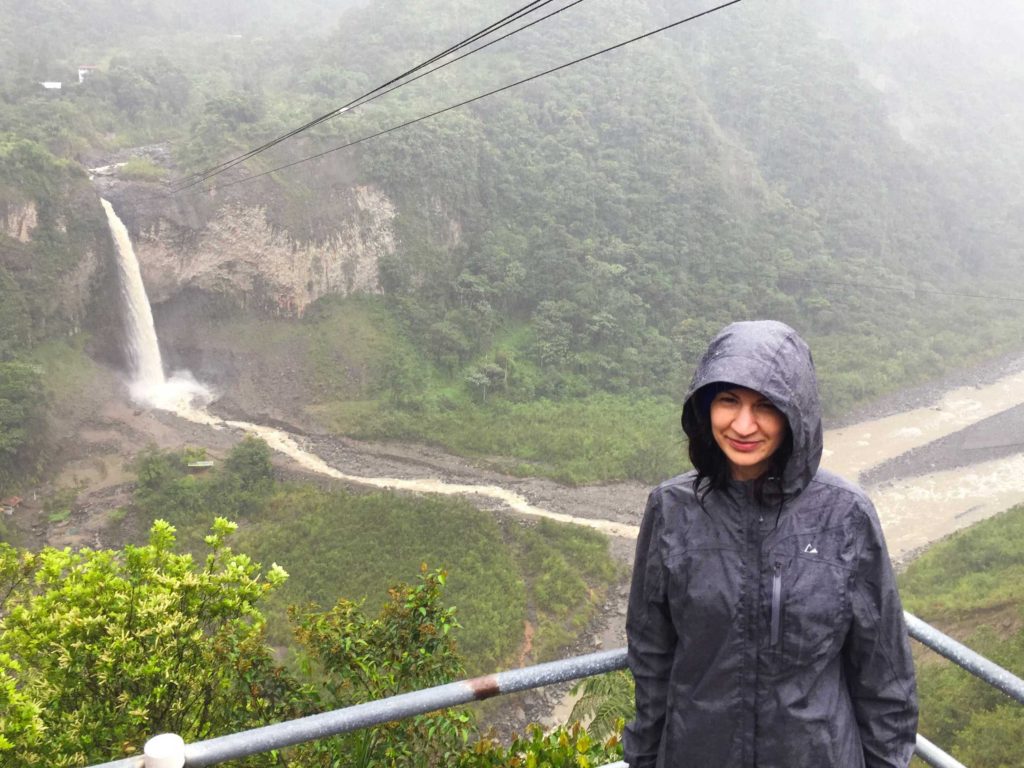 Shannon touring waterfalls near Banos, Ecuador