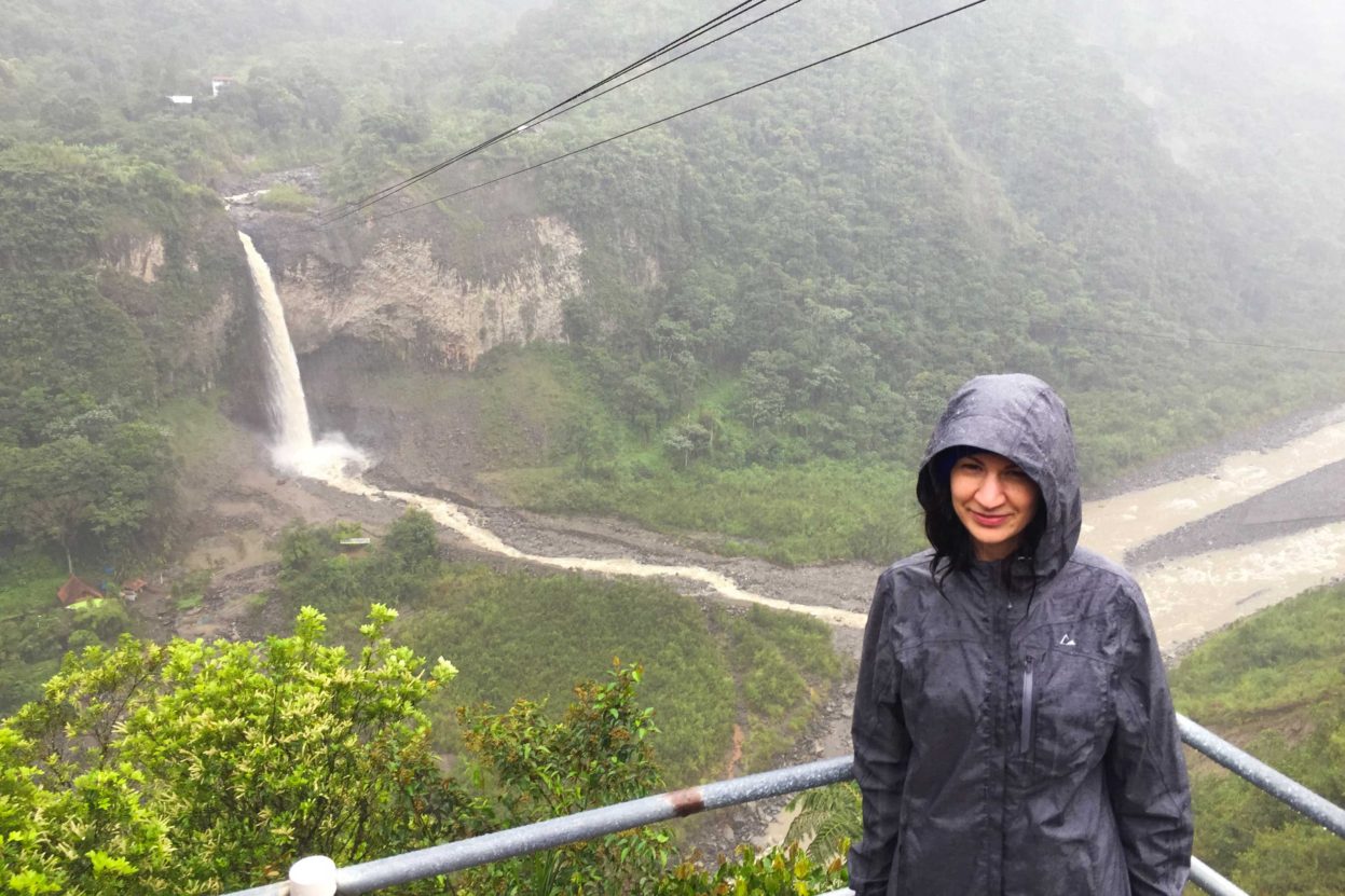 Shannon at a waterfall in Banos, Ecuador