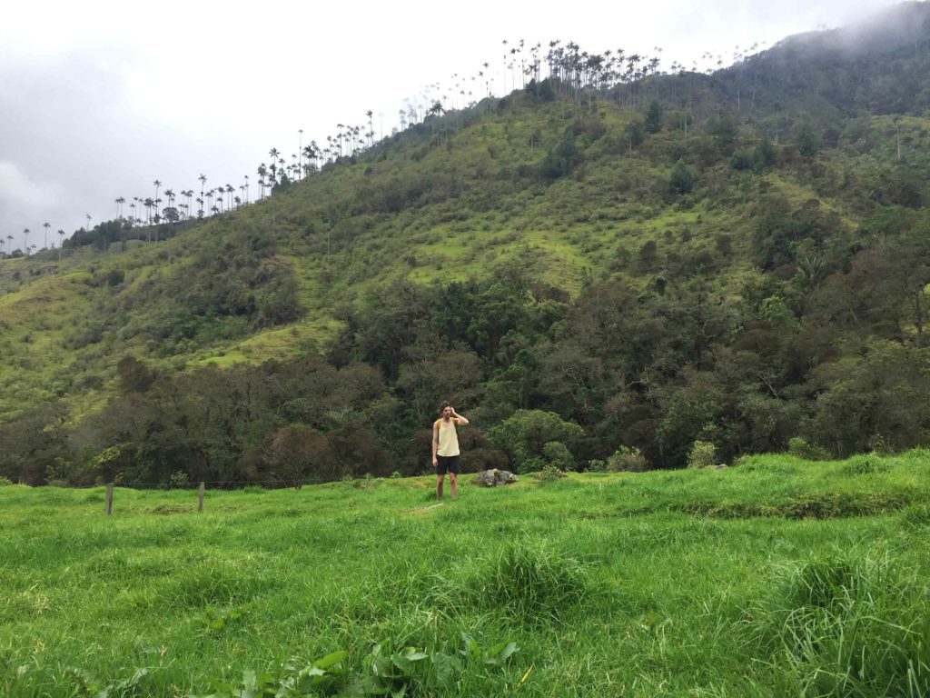 Justin in a field on the Valle de Cocora hike