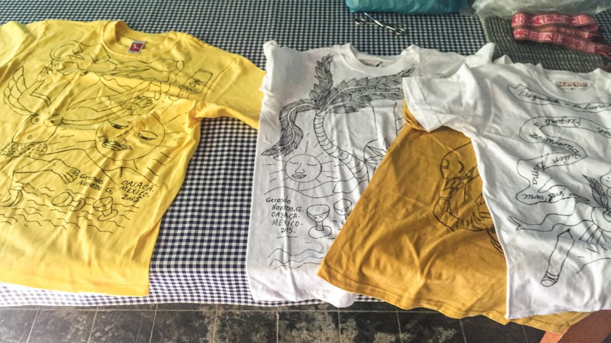 Very cool one-of-a-kind hand drawn t-shirts sold alongside the textiles. artistic t-shirts in oaxaca