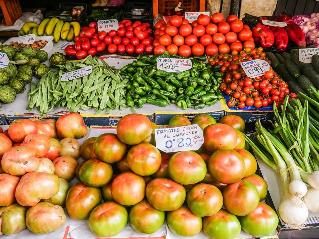 fruit stand spain food sherpas food tour