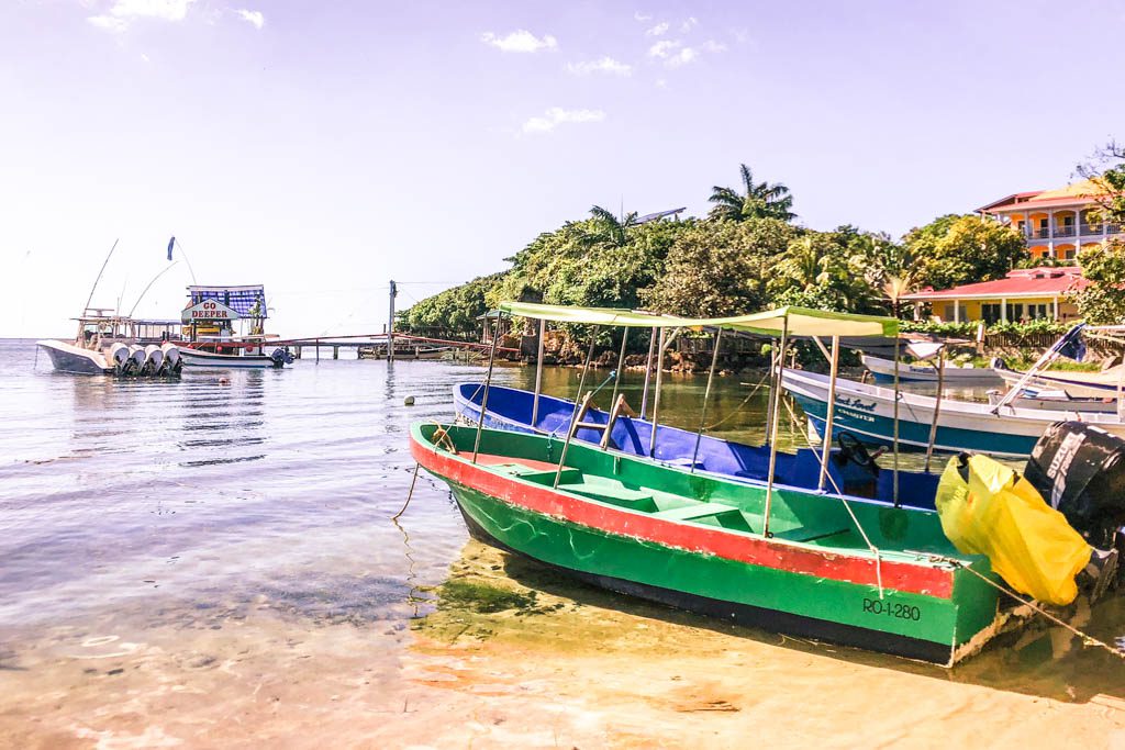 west end beach boats roatan