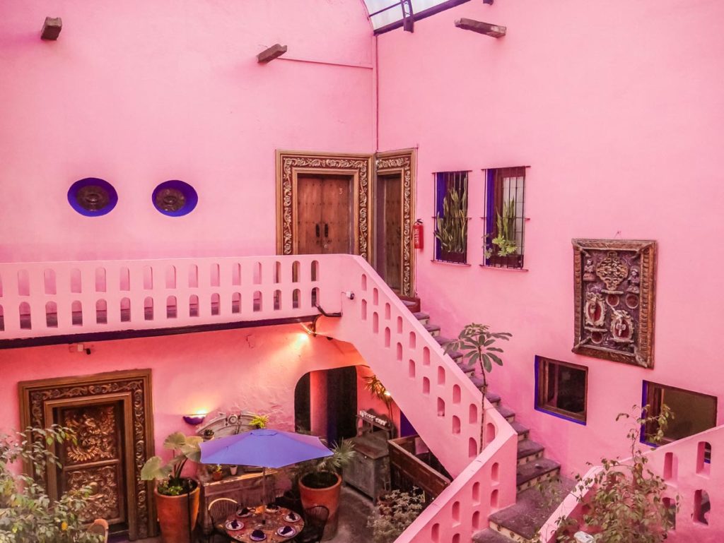 meson sacristia puebla hotel pink courtyard