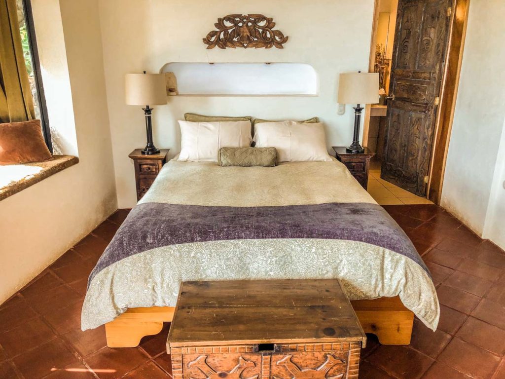 bed in room at lake atitlan retreat