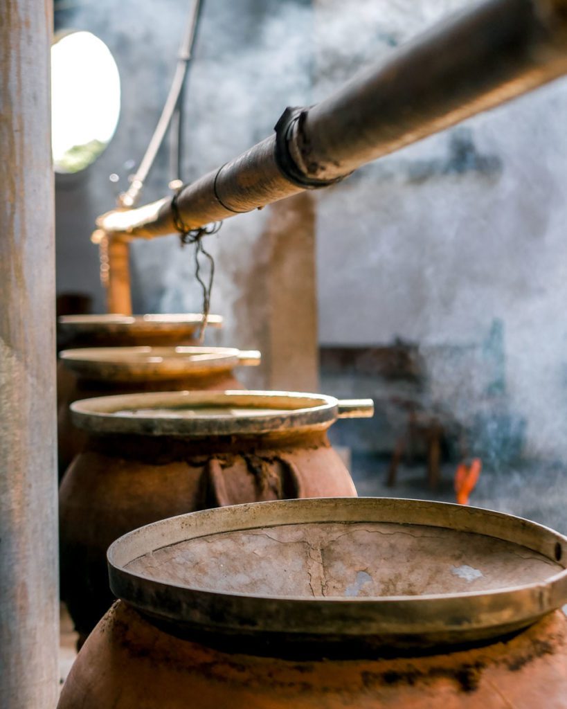 distilling mezcal at oaxaca palenque
