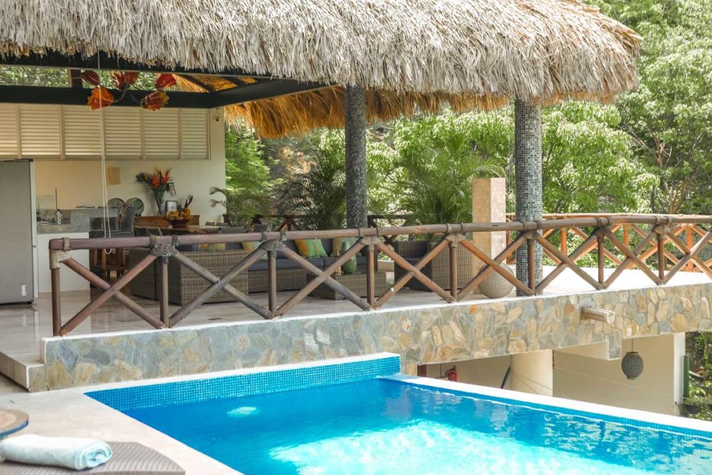 pool and open air living room kitchen dining room bb luxury house at playa estacahuite oaxaca